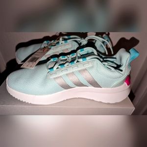 Big kids Adidas tennis shoes.